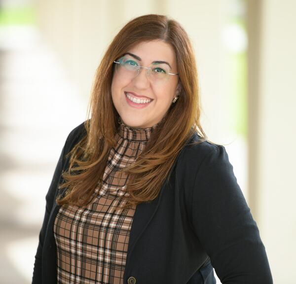 Headshot of CAPS Outreach Coordinator, Dr. Sarah Sawaf